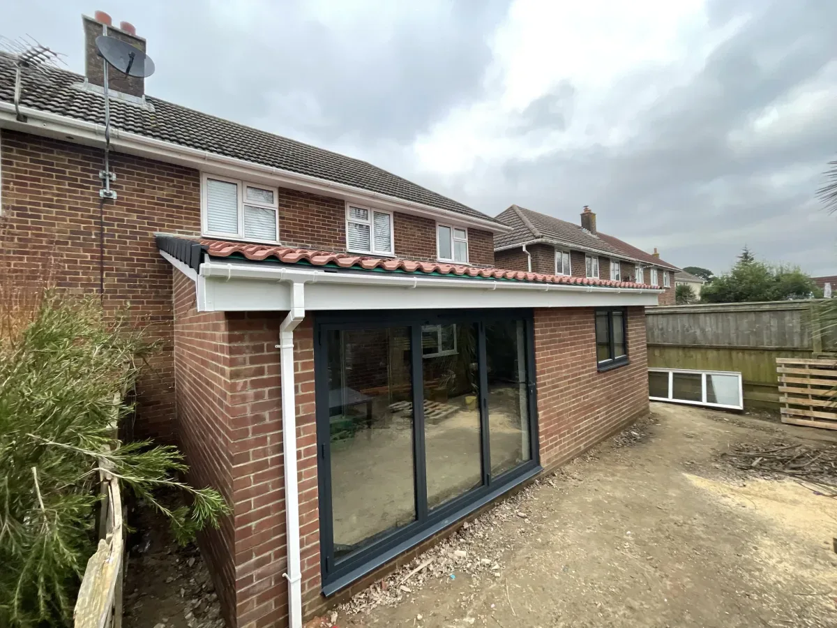 Completed rear extension with bi-fold doors in Bournemouth